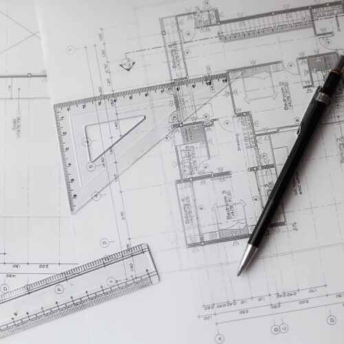 Image of engineering objects on workplace top view.Construction concept. Engineering tools.Vintage tone retro filter effect,soft focus(selective focus)